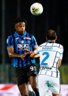 Atalanta's Duvan Zapata, left, in action during a Serie A soccer match between Atalanta and Inter Milan, at the Gewiss stadium in Bergamo, Italy, Saturday, Aug. 1, 2020. (Giuseppe Zanardelli/LaPresse via AP)