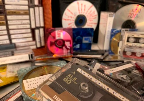 A stack of cassettes, MiniDiscs and CDs representing some of AP journalist Jaime Holguin’s decades-rich audio archive sit on a table, Sunday, July 12, 2020, in New York. (AP Photo/Jaime Holguin)
