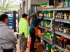 A clerk assists customers at the garden center at a Home Depot store in Harrisburg, Pa., on Wednesday, May 6, 2020. As swaths of Pennsylvania prepare for a limited reopening Friday, some fed-up business owners are jumping the gun and have resumed serving customers in defiance of Gov. Tom Wolf‚Äôs shutdown order. Home Depot said Wednesday that 