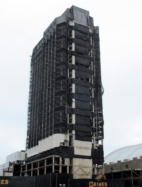 The main tower of the former Trump Plaza casino is shown in Atlantic City, N.J., Tuesday, Feb. 16, 2021. By mid-morning Wednesday, Feb. 17, 2021 the spot on the Atlantic City Boardwalk where movie stars, athletes and rock stars used to party _ and a future president honed his instincts for bravado and hype _ will be reduced to a smoking pile of rubble. (AP Photo/Wayne Parry)