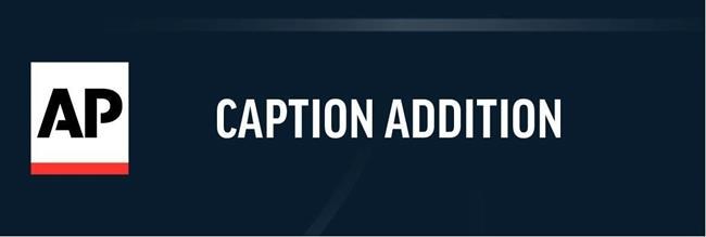 ADDS NAME OF ELECTOR - Terje Anderson, left, one of the three members of Vermont's Electoral College, casts his vote at the Statehouse in Montpelier, Vt., on Monday, Dec. 14, 2020. (AP Photo/Wilson Ring)