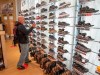 Stephane Tsar looks at some shoes at the Atmosphere sporting goods store Monday May 4, 2020 in St. Sauveur, Quebec. Retail stores outside the greater Montreal area have been allowed to reopen after weeks of forced closure due to the COVID-19 pandemic.THE CANADIAN PRESS/Ryan Remiorz