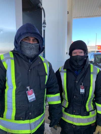Red River Co-op employees provide full service to their members, even in cold Winnipeg winters.