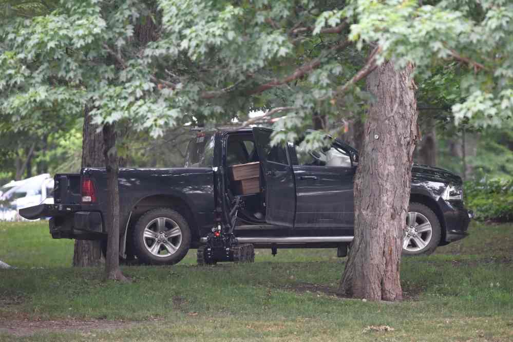 CP
A police robot approaches a pickup truck inside the grounds of Rideau Hall in Ottawa on July 2. (Adrian Wyld / Canadian Press files)