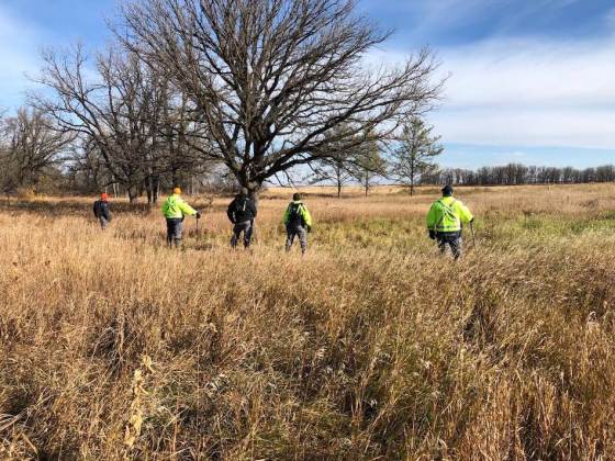 HANDOUT / RCMPRCMP officers search in Roseau River Anishinabe First Nation.