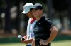 Rory McIlroy waits with his caddie Harry Diamond on the 9th hole during the third round of the RBC Heritage golf tournament, Saturday, June 20, 2020, in Hilton Head Island, S.C. (AP Photo/Gerry Broome)