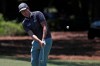 Webb Simpson chips onto the first green during the third round of the RBC Heritage golf tournament, Saturday, June 20, 2020, in Hilton Head Island, S.C. (AP Photo/Gerry Broome)