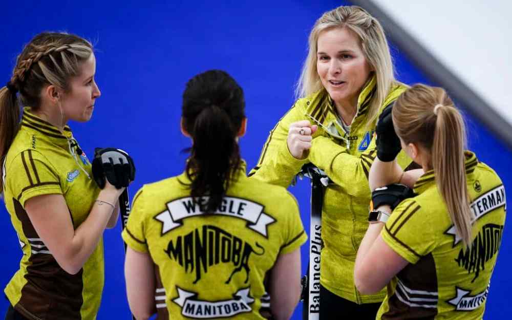Team Manitoba skip Jennifer Jones, second right, speaks with her team as they play Team Saskatchewan at the Scotties Monday.THE CANADIAN PRESS/Jeff McIntosh