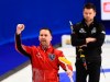 Team Newfoundland skip Brad Gushue celebrates a win as Team Wild Card skip Mike McEwen looks on during the championship round at the Brier in Kingston, Ont., on Friday, March 6, 2020. THE CANADIAN PRESS/Sean Kilpatrick