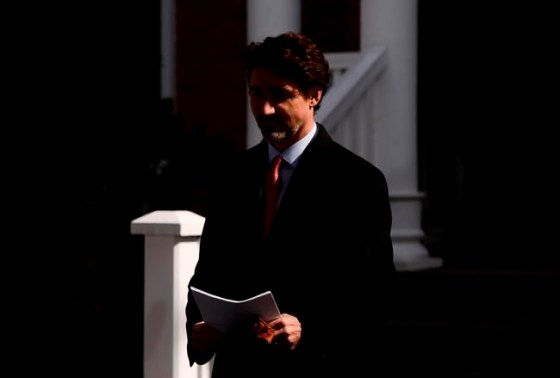 Prime Minister Justin Trudeau arrives to address Canadians on the COVID-19 situation from Rideau Cottage in Ottawa on Wednesday, March 25, 2020. THE CANADIAN PRESS/Sean Kilpatrick
