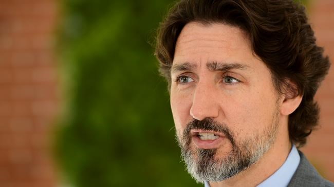 Prime Minister Justin Trudeau holds a press conference at Rideau Cottage amid the COVID-19 pandemic in Ottawa on Thursday, May 21, 2020. THE CANADIAN PRESS/Sean Kilpatrick