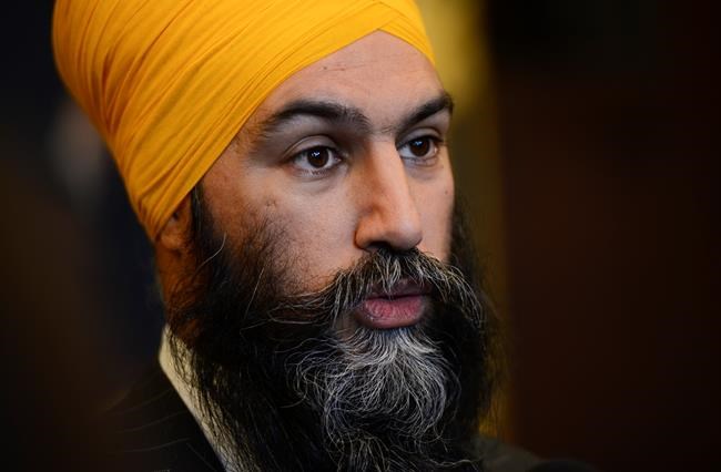 NDP Leader Jagmeet Singh talks to reports on Parliament Hill following a caucus meeting in Ottawa on Wednesday, Feb. 19, 2020. THE CANADIAN PRESS/Sean Kilpatrick