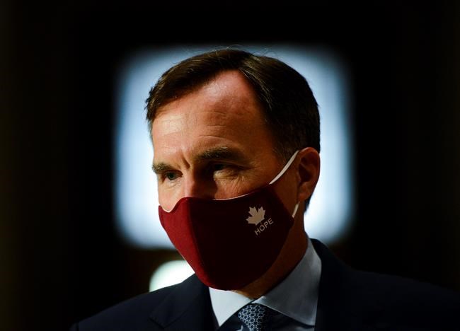 Minister of Finance Bill Morneau takes part in a media lock-up for the federal government's Economic and Fiscal Snapshot 2020 in Ottawa on Wednesday, July 8, 2020. THE CANADIAN PRESS/Sean Kilpatrick