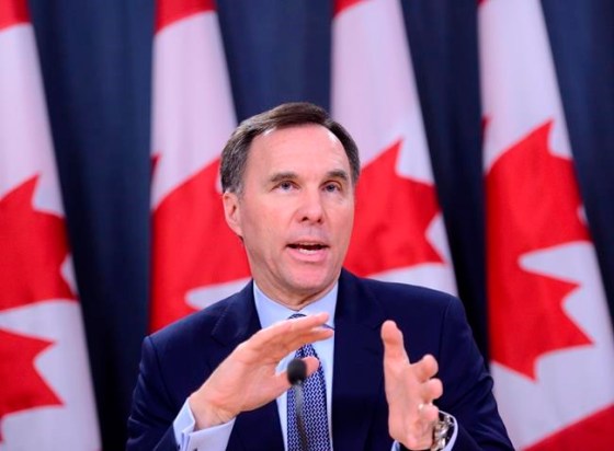 Minister of Finance Bill Morneau takes part in a press conference at the National Press Theatre in Ottawa on Friday, March 13, 2020. THE CANADIAN PRESS/Sean Kilpatrick