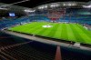 In this Tuesday, March 10, 2020 photo the empty stadium is pictured prior to the Champions League round of 16, 2nd leg soccer match between RB Leipzig and Tottenham Hotspur in Leipzig, Germany. Due to the new coronavirus outbreak several upcoming matches of the German Bundesliga will take place without the attendance of spectators. For most people, the new coronavirus causes only mild or moderate symptoms, such as fever and cough. For some, especially older adults and people with existing health problems, it can cause more severe illness, including pneumonia. (AP Photo/Michael Sohn)