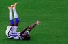 Hertha's Dodi Lukebakio lies on the pitch during the German Bundesliga soccer match between Hertha BSC Berlin and Eintracht Frankfurt in Berlin, Germany, Friday, Sept. 25, 2020. (AP Photo/Michael Sohn, pool)