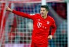 Bayern's Robert Lewandowski celebrates after scoring his side's fourth goal during the German Bundesliga soccer match between FC Bayern Munich and SV Werder Bremen in Munich, Germany, Saturday, Dec. 14, 2019. (AP Photo/Matthias Schrader)