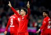 Bayern's scorer Philippe Coutinho, front, celebrates after scoring his side's sixth goal during the German Bundesliga soccer match between FC Bayern Munich and SV Werder Bremen in Munich, Germany, Saturday, Dec. 14, 2019. (AP Photo/Matthias Schrader)