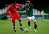 Republic of Ireland's Callum Robinson, right, and Luxembourg's Marvin Da Graca battle for the ball during their World Cup 2022 group A qualifying soccer match between at the Aviva Stadium, Dublin, Saturday, March 27, 2021. (Brian Lawless/PA via AP)
