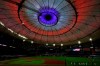 The roof inside Tropicana Field is illuminated red, white, and blue during the playing of the National Anthem before a baseball game between the Tampa Bay Rays and the Boston Red Sox Friday, Sept. 11, 2020, in St. Petersburg, Fla. Today marks the 19th anniversary of the Sept. 11, 2001 terrorist attacks. (AP Photo/Chris O'Meara)