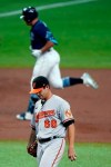 Baltimore Orioles starting pitcher Tommy Milone (69) reacts as Tampa Bay Rays' Hunter Renfroe runs around the bases following his two-run home run during the second inning of a baseball game Tuesday, Aug. 25, 2020, in St. Petersburg, Fla. (AP Photo/Chris O'Meara)