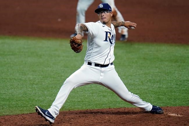 Tampa Bay Rays pitcher Anthony Banda delivers to the Toronto Blue Jays during the 10th inning of a baseball game Saturday, Aug. 22, 2020, in St. Petersburg, Fla. (AP Photo/Chris O'Meara)