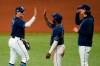 Tampa Bay Rays' Hunter Renfroe, left, celebrates with Randy Arozarena, center, and Tyler Glasnow after the Rays defeated the Toronto Blue Jays during Game 2 of an American League wild-card baseball series Wednesday, Sept. 30, 2020, in St. Petersburg, Fla. (AP Photo/Chris O'Meara)