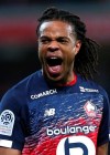 Lille's Loic Remy, reacts after scoring during his French League One soccer match between Lille and Lyon at the Lille Metropole stadium in Villeneuve d'Ascq, northern France, Sunday, March 8, 2020. (AP Photo/Michel Spingler)