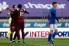 PSG's Pablo Sarabia, right, and PSG's Moise Kean congratulate after Sarabia scored his side first goal while Strasbourg's Anthony Caci, right, walks away during the French League One soccer match Strasbourg against Paris Saint-Germain at the stade de la Meinau stadium in Strasbourg, eastern France, Saturday, April 10, 2021. (AP Photo/Jean-Francois Badias)