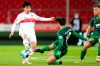 Stuttgart's Wataru Endo, left, and Augsburg's Jan Moravek in action during the Bundesliga soccer match between VfB Stuttgart and FC Augsburg at the Mercedes-Benz Arena, Stuttgart, Germany, Friday May 7, 2021. (Tom Weller/dpa via AP)