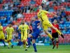 Liam McGing, right, of Wellington Phoenix jumps over Roy O'Donovan of the Newcastle Jets to head the ball during their A-League match in Newcastle on Feb. 28, 2021. The A-League announced Friday, April 30, 2021, that the Phoenix, fighting for a playoff spot, will play a home match in the New Zealand capital of Wellington on May 22. (Darren Pateman/AAP Image via AP)