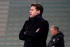 PSG's head coach Mauricio Pochettino watches from the touchline during the French League One soccer match between Saint-Etienne and Paris Saint-Germain at the Geoffroy Guichard stadium, in Saint-Etienne, central France, Wednesday, Jan. 6, 2021. (AP Photo/Laurent Cipriani)