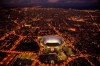 FILE - In this Tuesday, Sept. 19, 2017 file photo, the Camp Nou stadium is illuminated in Barcelona, Spain. (AP Photo/Emilio Morenatti, File)