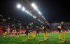 Wolves players warm-up before the English Premier League soccer match between Manchester Utd and Wolverhampton Wanderers at Old Trafford stadium in Manchester, England, Tuesday Dec. 29, 2020. (Martin Rickett, Pool via AP)