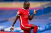 FILE - In this Sept. 20, 2020 file photo Liverpool's Sadio Mane celebrates after scoring during the English Premier League soccer match between Chelsea and Liverpool at Stamford Bridge Stadium. Liverpool forward Sadio Mane has become the second player to test positive this week for the coronavirus at the English Premier League champions. (Michael Regan/Pool via AP, File)