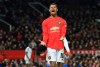 FILE - In this Wednesday, Dec. 18, 2019 file photo Manchester United's Marcus Rashford, reacts during the English League Cup quarter final soccer match between Manchester United and Colchester United at Old Trafford in Manchester, England. British Prime Minister Boris Johnson made an abrupt about-face Tuesday June 16, 2020 and agreed to keep funding meals for needy pupils over the summer holidays, after a campaign headed by young soccer star Marcus Rashford. The Manchester United and England player has been pressing the government not to stop a meal voucher program at the end of the school term in July. (AP Photo/Jon Super, File)
