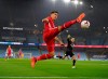 Liverpool's Roberto Firmino tries to control the ball during the English Premier League soccer match between Manchester City and Liverpool at the Etihad stadium in Manchester, England, Sunday, Nov. 8, 2020. (Shaun Botterill/Pool via AP)