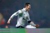 FILE - In this Monday, Feb. 25, 2013 file photo Tottenham Hotspur's Gareth Bale celebrates scoring his second and the winning goal, during the English Premier League soccer match between West Ham and Tottenham Hotspur at Upton Park stadium in London. (AP Photo/Matt Dunham, File)