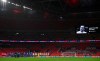 Players applaud in memory of the life of the late England soccer great Nobby Stiles who recently died, before the international friendly soccer match between England and Ireland at Wembley stadium in London, England, Thursday Oct. 12, 2020. (Ben Stansall/Pool via AP)
