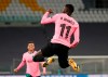 Barcelona's Ousmane Dembele celebrates scoring his side's opening goal during the Champions League group G soccer match between Juventus and Barcelona at the Allianz stadium in Turin, Italy, Wednesday, Oct. 28, 2020. (AP Photo/Antonio Calanni)
