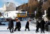 US President Donald Trump, center, arrives in Davos, Switzerland on Marine One, Tuesday, Jan. 21, 2020. President Trump arrived in Switzerland on Tuesday to start a two-day visit to the World Economic Forum. (AP Photo/Evan Vucci)