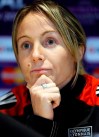 FILE - In this Wednesday, May 22, 2013 file photo Lyon's captain Sonia Bompastor listens during a press conference at Stamford Bridge Stadium in London. Europe's most successful women's soccer team has hired a woman as its coach for the first time with Lyon's appointment of Sonia Bompastor to replace Jean-Luc Vasseur. (AP Photo/Kirsty Wigglesworth, File)