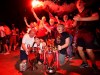 Liverpool supporters with replica Premier League and Champions League trophies as they celebrate outside of Anfield Stadium in Liverpool, England, Thursday, June 25, 2020 after Liverpool clinched the English Premier League title. Liverpool took the title after Manchester City failed to beat Chelsea on Wednesday evening. (AP photo/Jon Super)