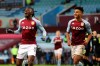 Aston Villa's Bertrand Traore, left, celebrates after scoring his side's second goal during the English Premier League soccer match between Aston Villa and Newcastle United at Villa Park in Birmingham, England, Saturday, Jan. 23, 2021. (Clive Brunskill/Pool via AP)