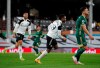 Fulham's Ademola Lookman celebrates after scoring the opening goal during the English Premier League soccer match between Fulham and Sheffield United at Craven Cottage in London, England, Saturday, Feb. 20, 2021. (Andrew Couldridge/Pool via AP)