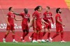 Liverpool's Trent Alexander-Arnold, left, celebrates after scoring the opening goal during the English Premier League soccer match between Liverpool and Crystal Palace at Anfield Stadium in Liverpool, England, Wednesday, June 24, 2020. (Paul Ellis/Pool via AP)
