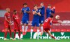 Liverpool's Trent Alexander-Arnold scores his side's second goal from a free-kick during the English Premier League soccer match between Liverpool and Chelsea at Anfield stadium in Liverpool, England, Wednesday, July 22, 2020. (Laurence Griffiths, Pool via AP)