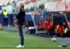 Barcelona's head coach Quique Setien watches from the sideline during the Champions League quarterfinal soccer match between Barcelona and Bayern Munich in Lisbon, Portugal, Friday, Aug. 14, 2020. (Rafael Marchante/Pool via AP)