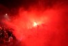 Liverpool supporters celebrate as they gather outside of Anfield Stadium in Liverpool, England, Thursday, June 25, 2020 after Liverpool clinched the English Premier League title. Liverpool took the title after Manchester City failed to beat Chelsea on Wednesday evening. (AP photo/Jon Super)