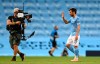 Manchester City's David Silva waves as he leaves the field after the Champions League round of 16, second leg soccer match between Manchester City and Real Madrid at the Etihad Stadium in Manchester, England, Friday, Aug. 7, 2020. Manchester City won the match 2-1 to advance 4-2 on aggregate. (AP Photo/Shaun Botterill, Pool)